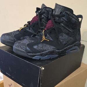 Jordan Black and Gold Athletic Shoes